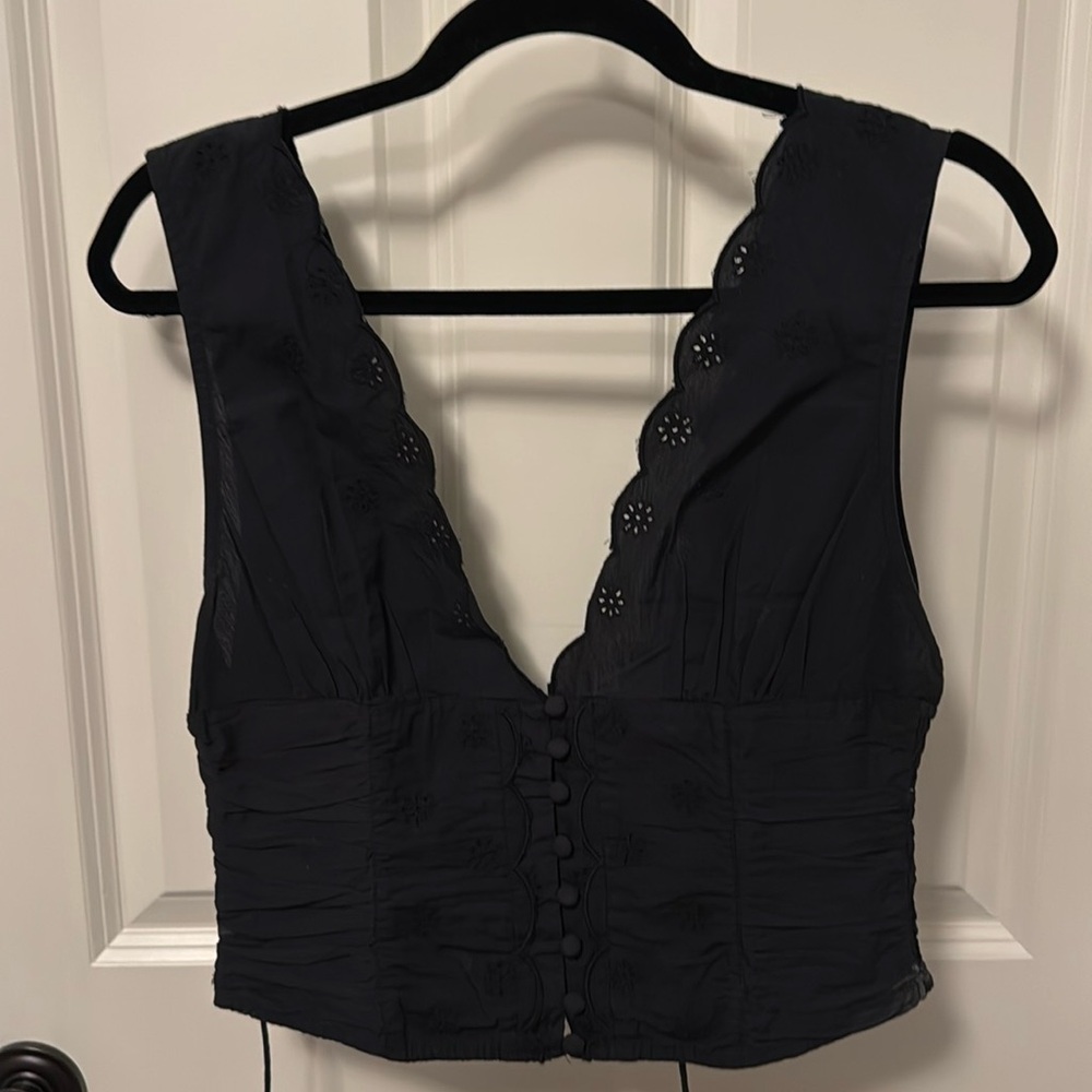 Free people black eyelet scallop top. NWOT